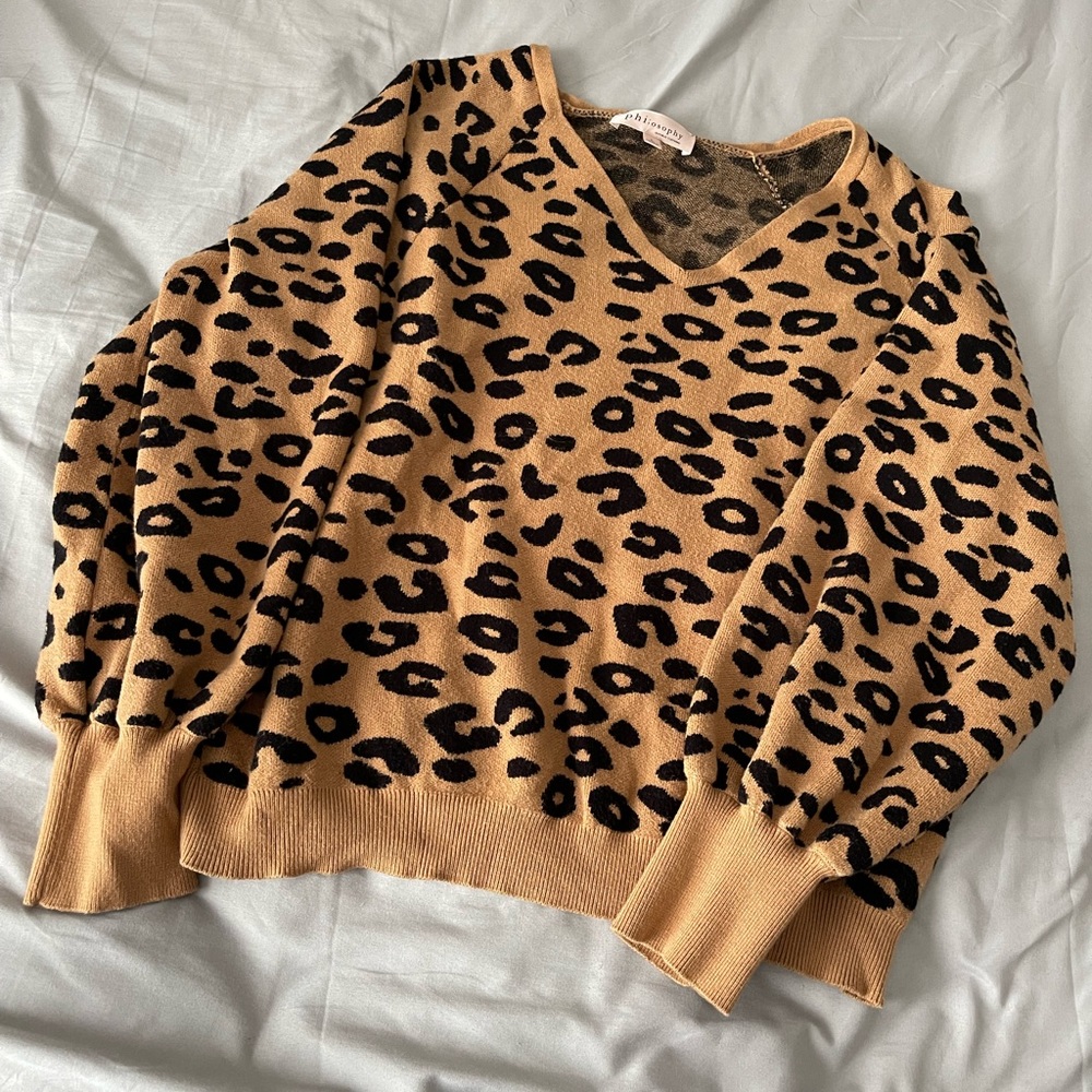 ADORABLE sweater! Slightly cropped.